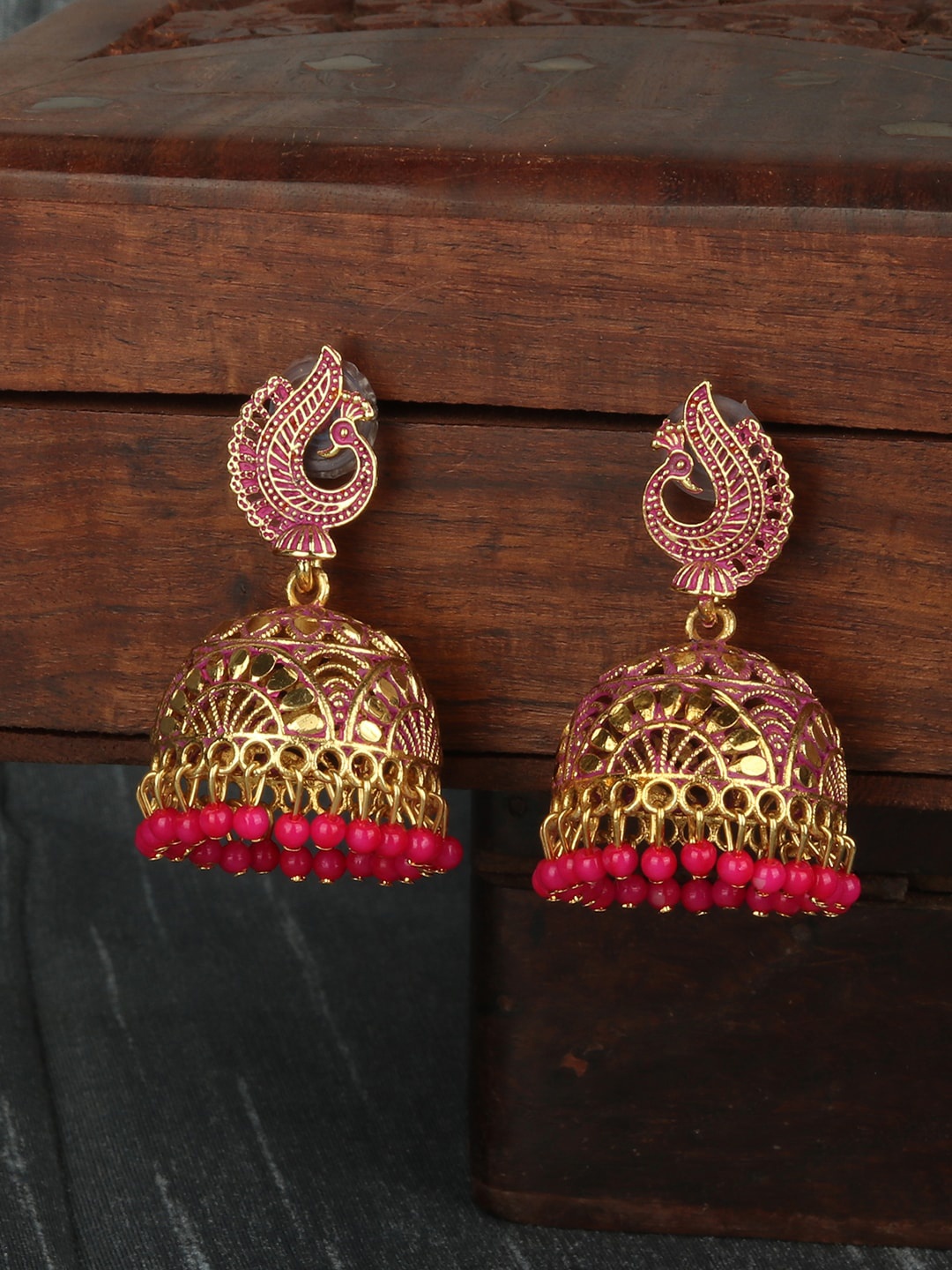 

ANIKAS CREATION Magenta & Gold-Toned Dome Shaped Jhumkas
