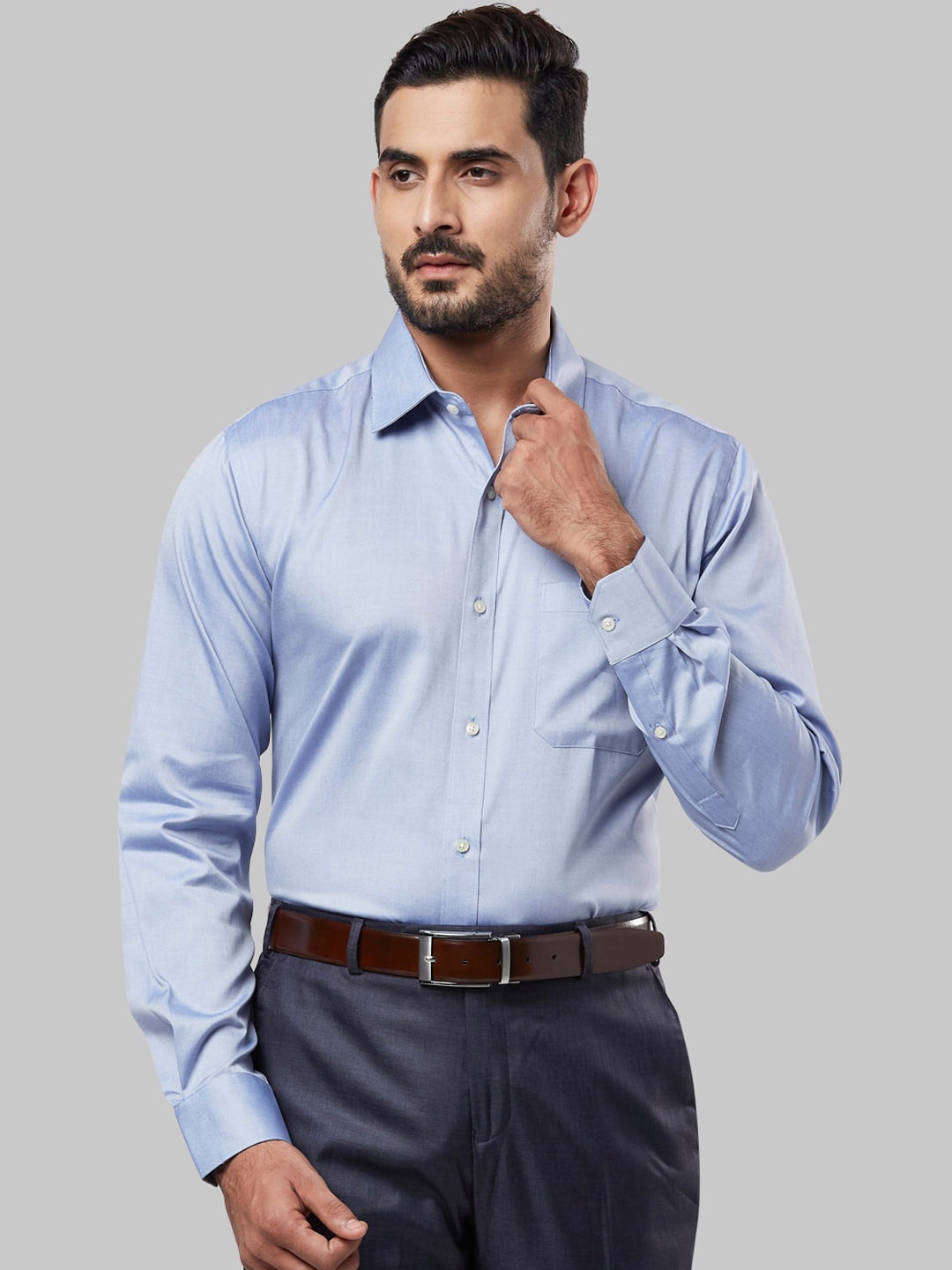 

Raymond Men Blue Regular Fit Solid Formal Shirt