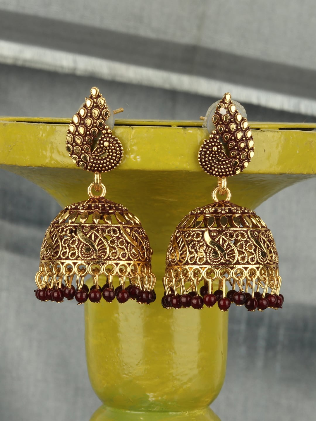 

ANIKAS CREATION Gold-Plated & Maroon Dome Shaped Jhumkas