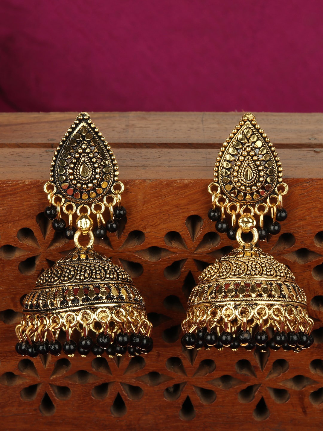 

ANIKAS CREATION Black & Gold-Plated Teardrop Shaped Jhumkas