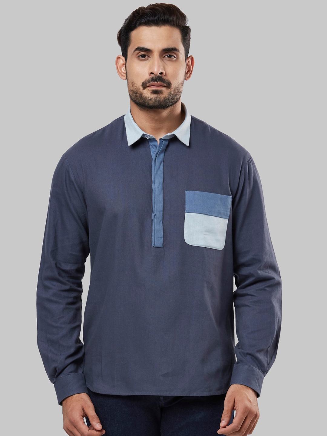 

Ethnix by Raymond Men Navy Blue Tailored Fit Solid Casual Shirt