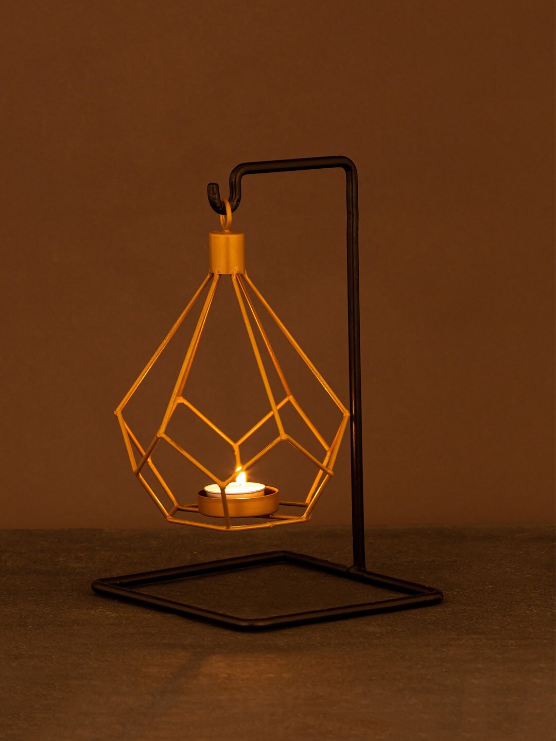

Aapno Rajasthan Gold-Toned & Black Solid Handcrafted Hanging Tea Light Candle Holder