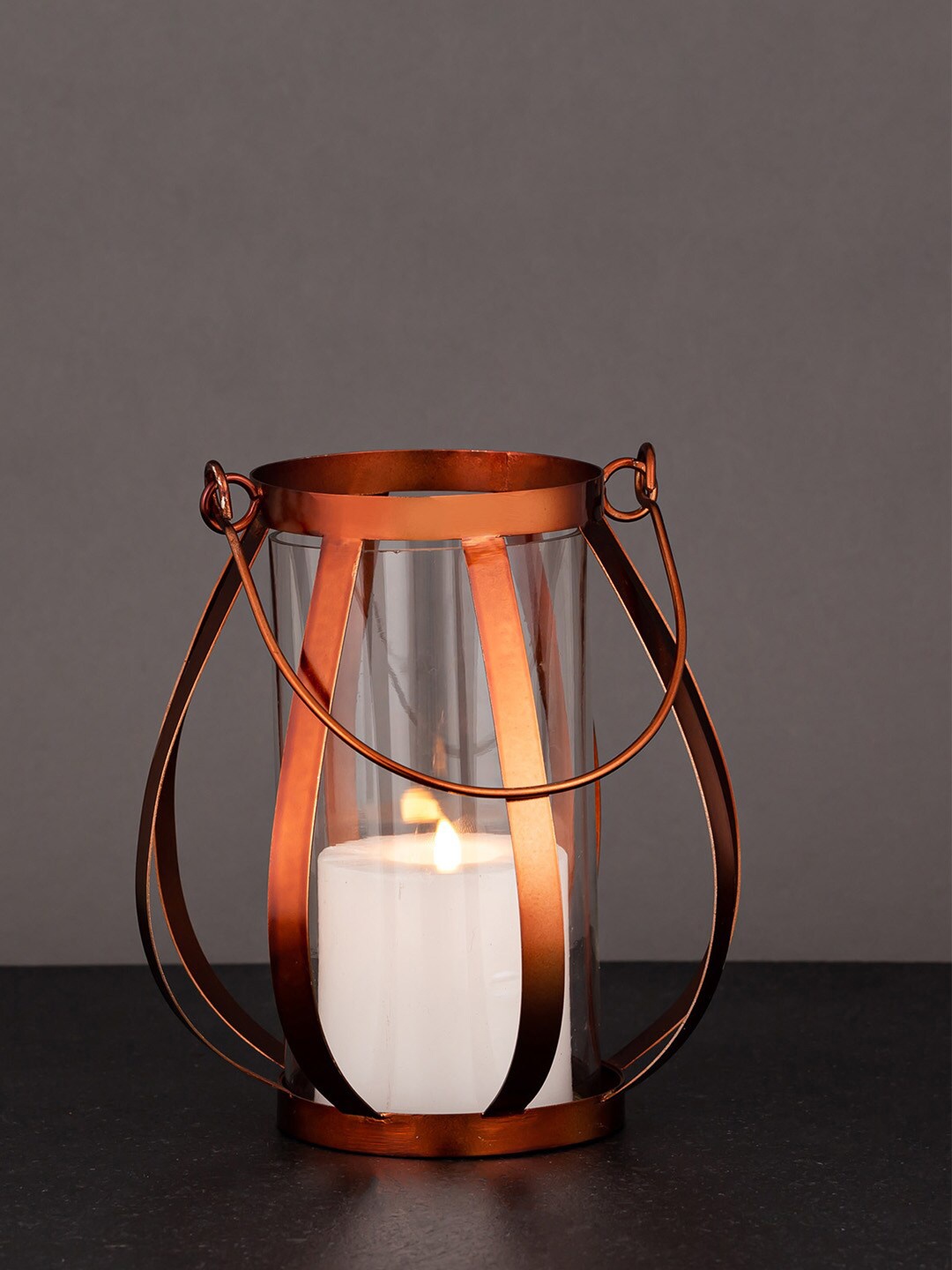 

Aapno Rajasthan Copper-Toned Solid Contemporary Candle Holder Table Lantern
