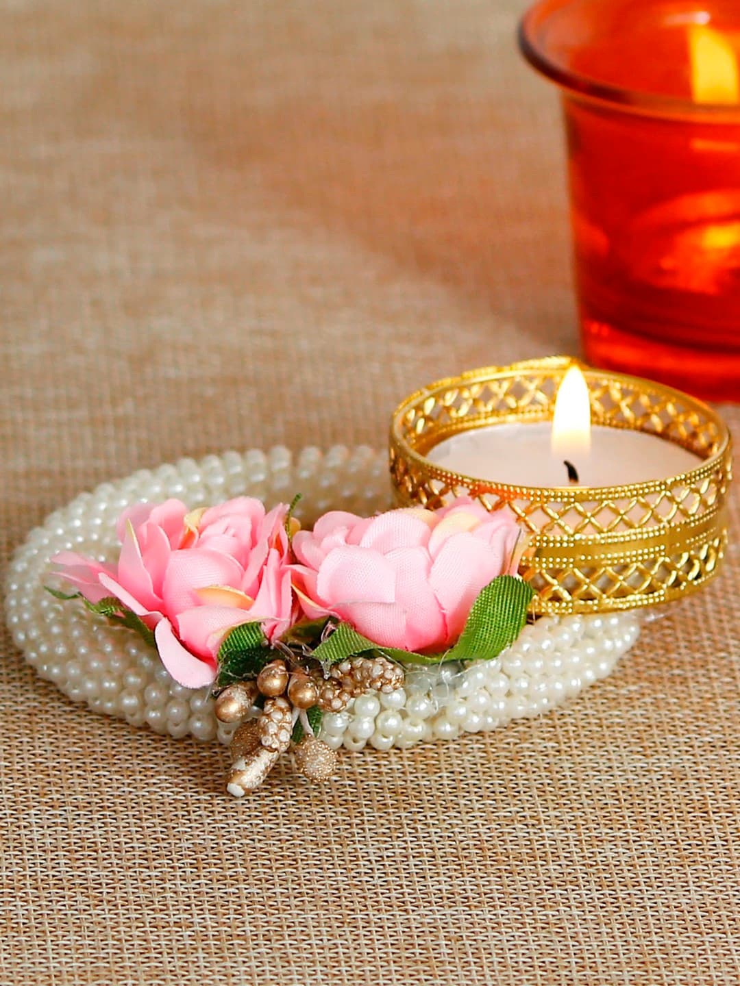 

eCraftIndia White & Pink Handcrafted Tea Light Holder On Pearl Bangle