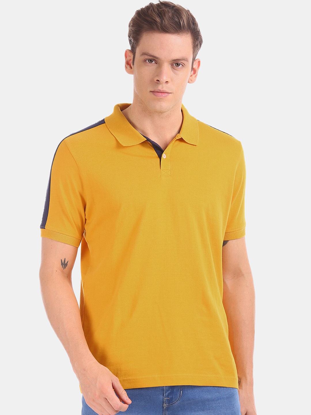 

Colt Men Yellow Solid Polo Collar T-shirt