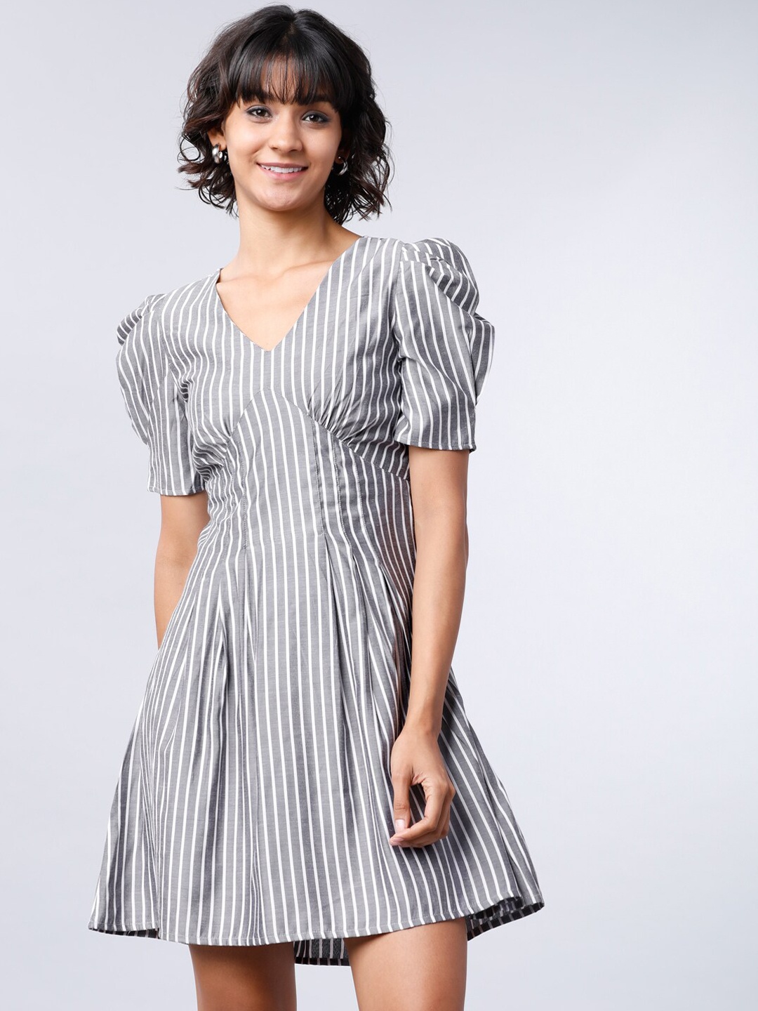 

Tokyo Talkies Women Grey Striped Fit and Flare Dress