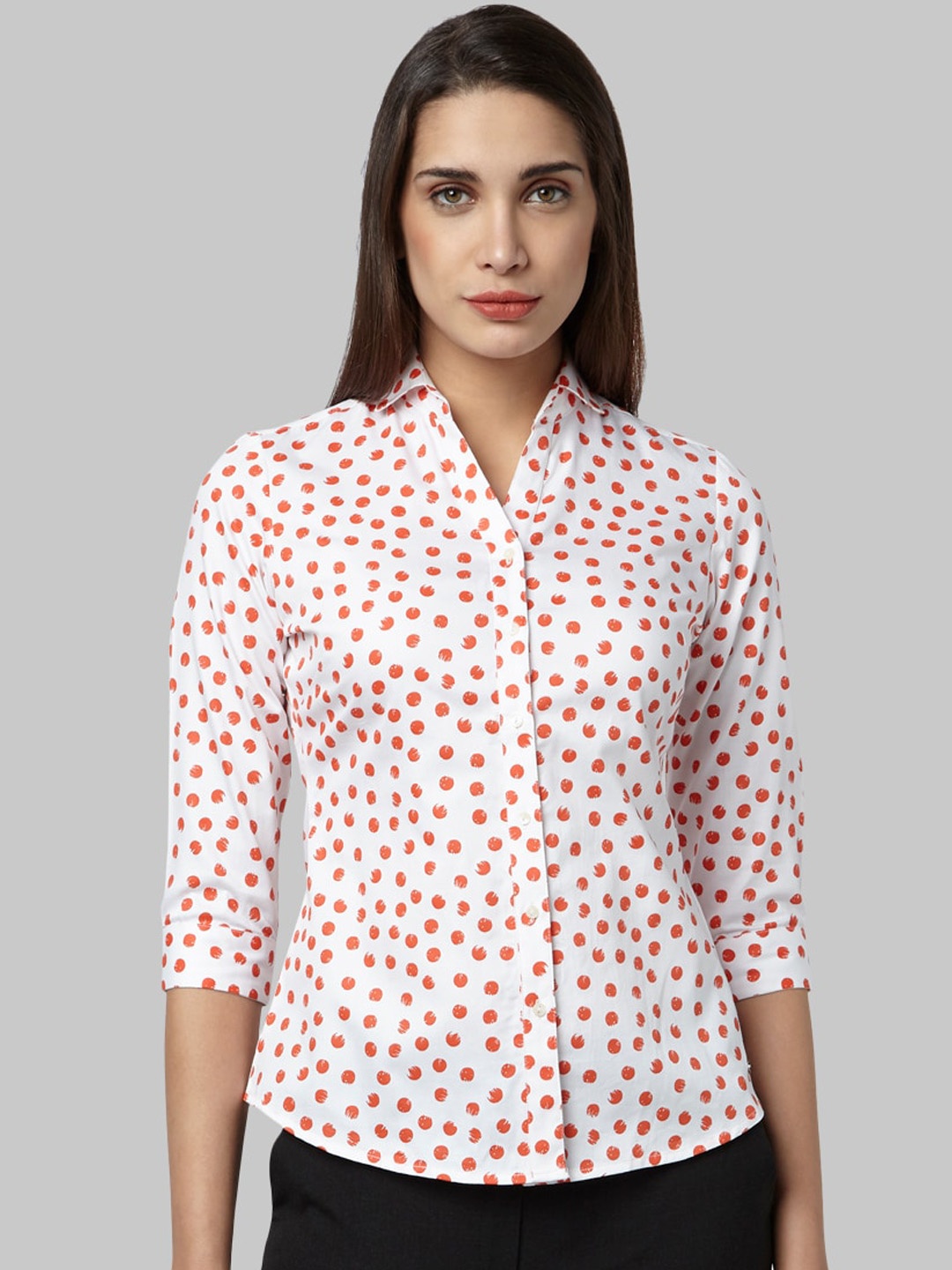 

Park Avenue Woman Orange & White Printed Casual Shirt