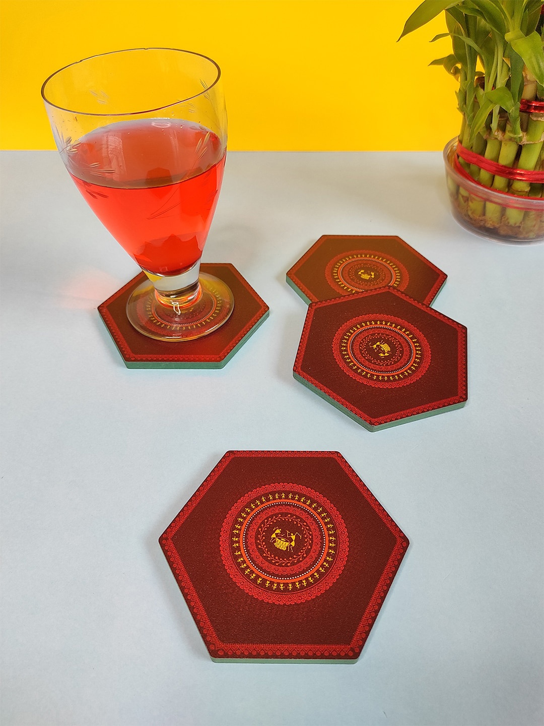 

CRAYTON Set Of 4 Maroon & Red Warli Print Hexagon Wooden Coasters