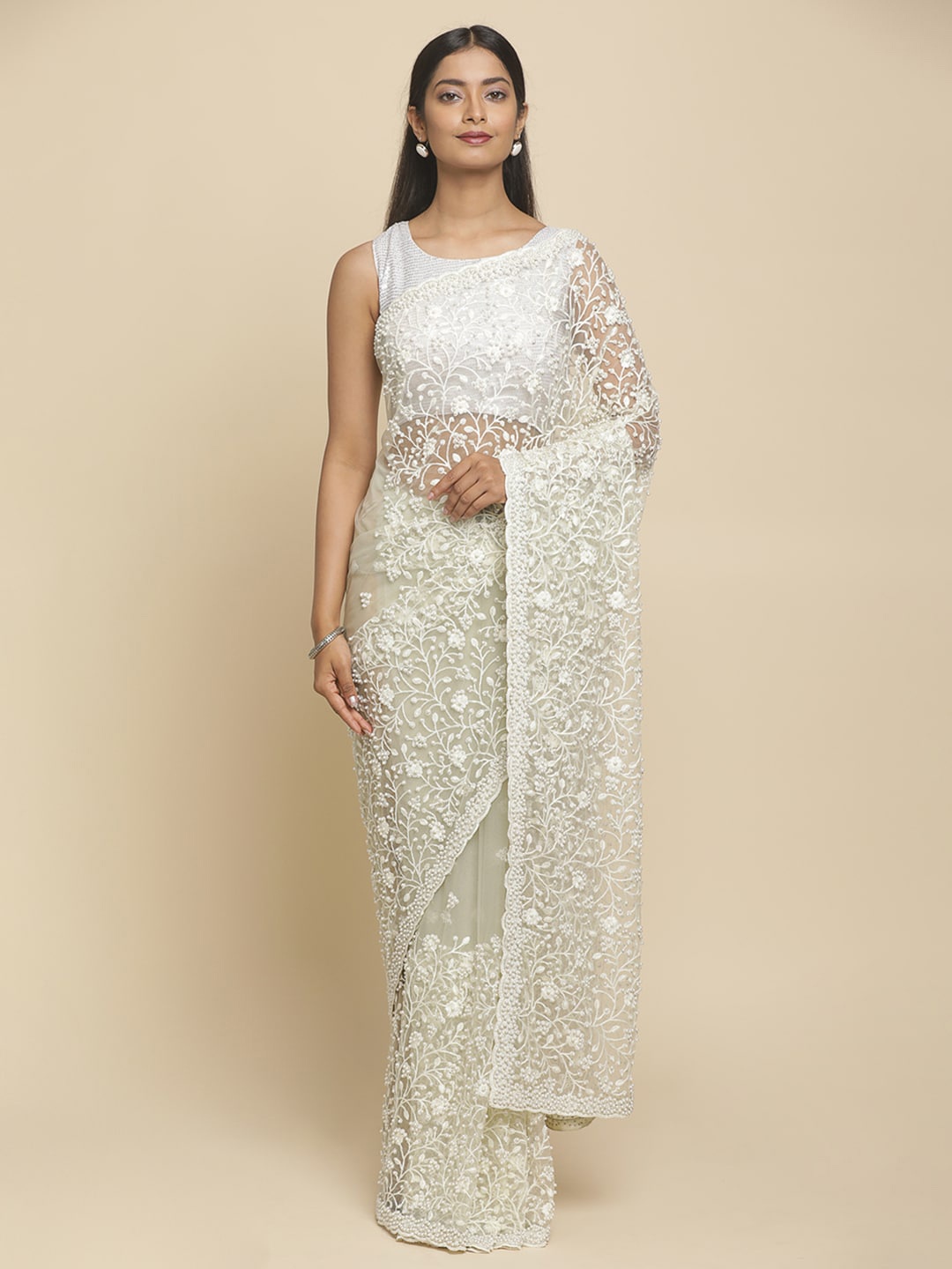 

Koskii Green & White Net Embroidered Saree