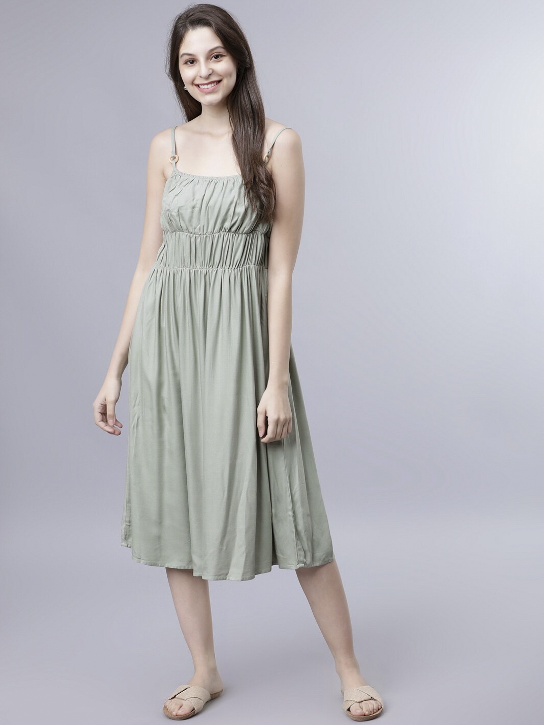 

Tokyo Talkies Women Green Solid Fit and Flare Dress