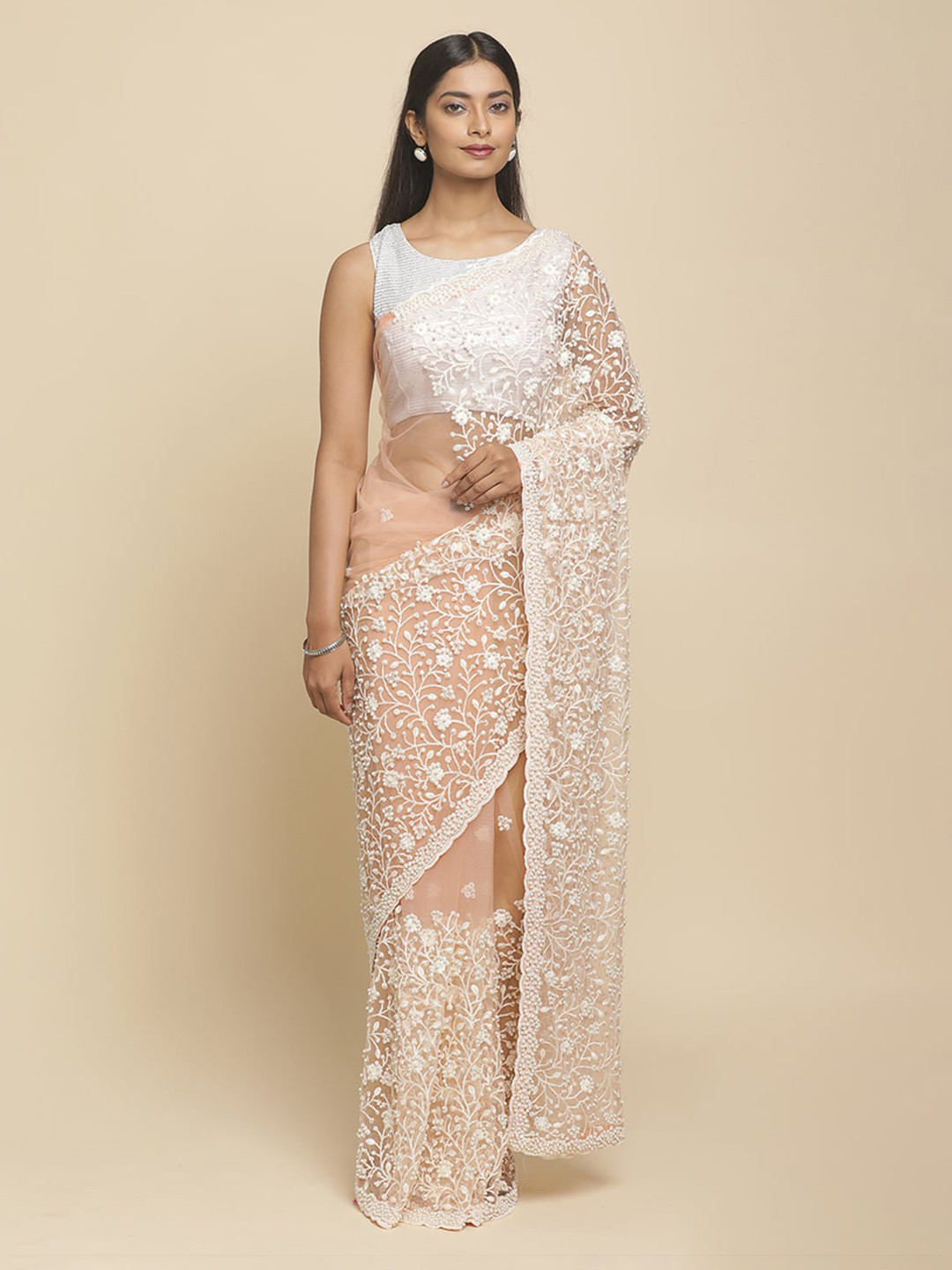 

Koskii Peach-Coloured & Off-White Net Embroidered Saree