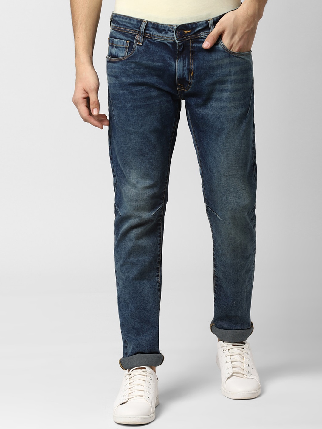 

Peter England Casuals Men Navy Blue Regular Fit Mid-Rise Low Distress Jeans