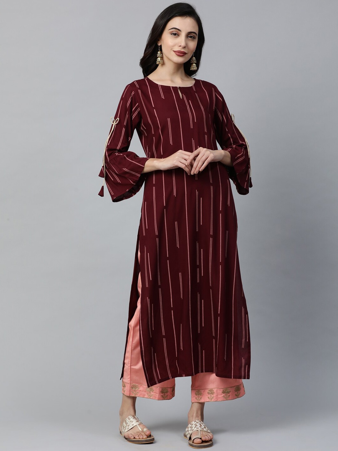 

Indo Era Women Maroon Striped Straight Kurta