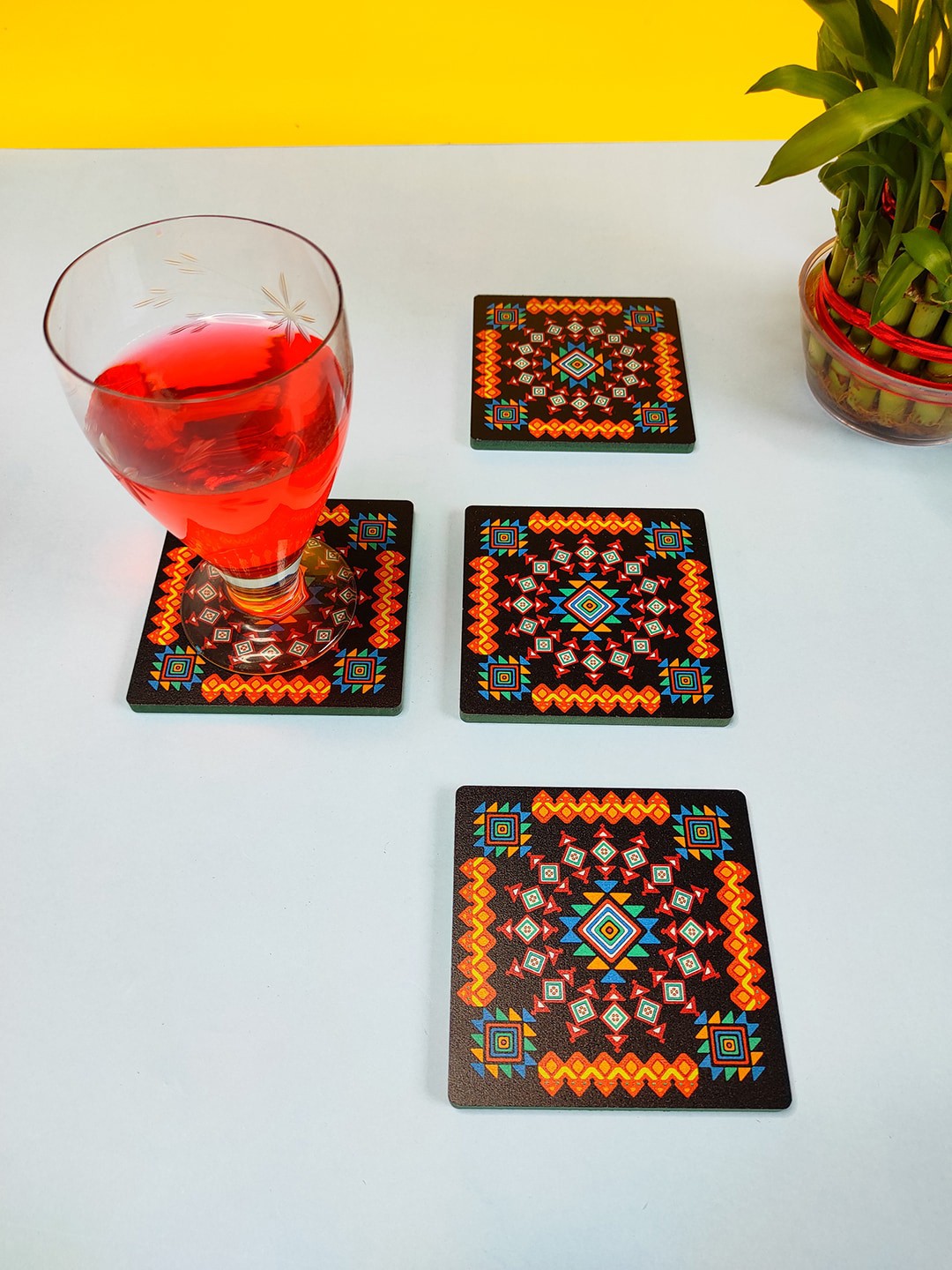 

CRAYTON Set Of 4 Black & Orange Geometric Print Square Wooden Coasters