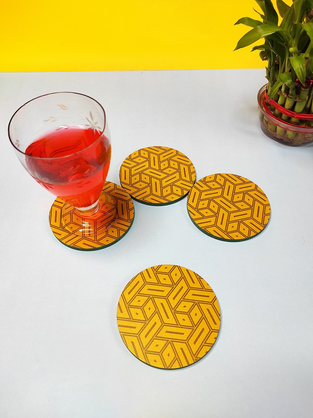 

CRAYTON Set Of 4 Yellow & Black Abstract Print Round Wooden Coasters
