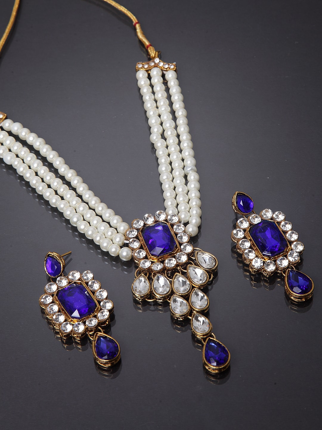 

Shining Diva Women Gold-Plated White & Blue Pearl and Kundan Embellished Jewellery Set