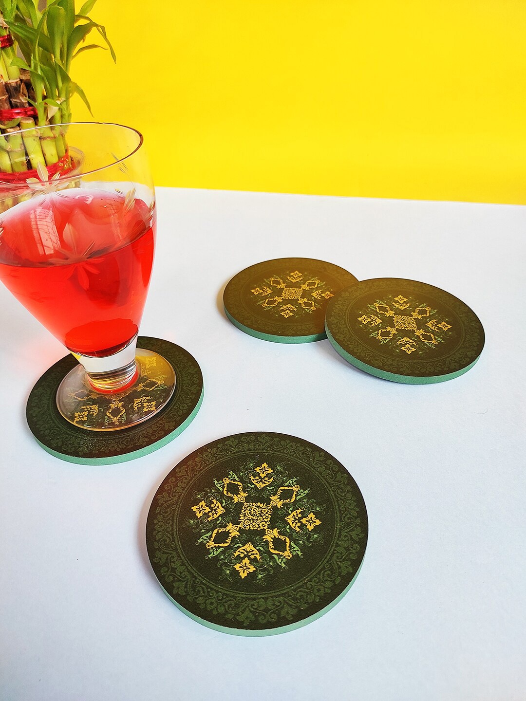 

CRAYTON Set Of 4 Green & Yellow Mughal Print Round Wooden Coasters