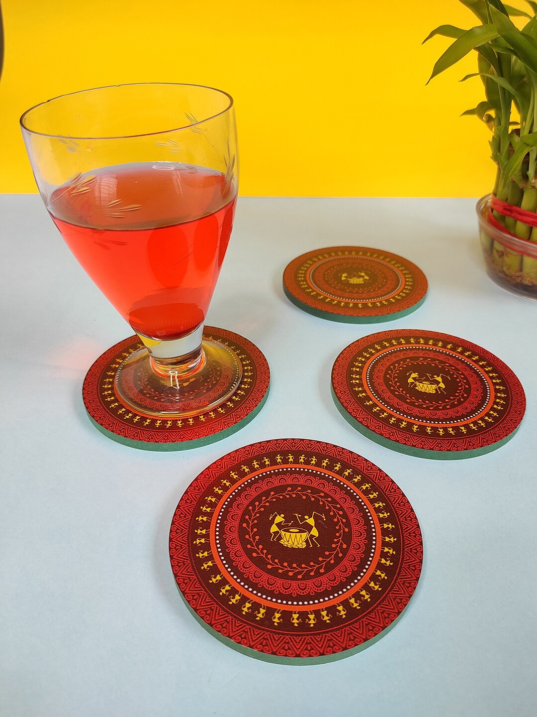 CRAYTON Set Of 4 Maroon & Red Warli Print Round Wooden Coasters