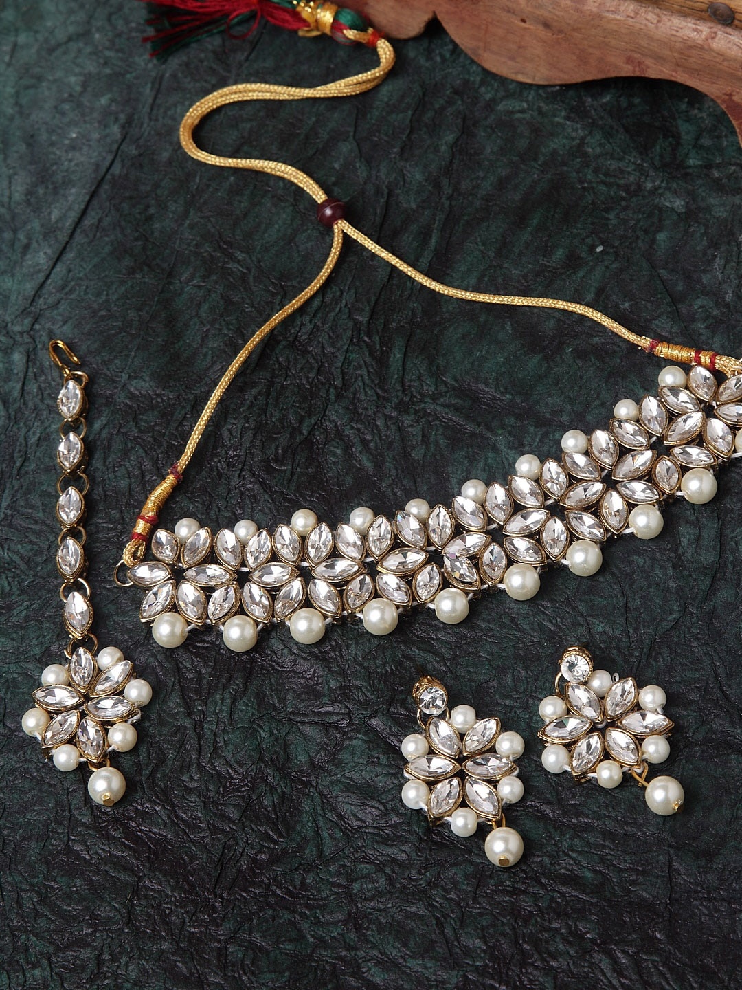 

Shining Diva Women Gold-Plated & White Kundan Jewellery Set