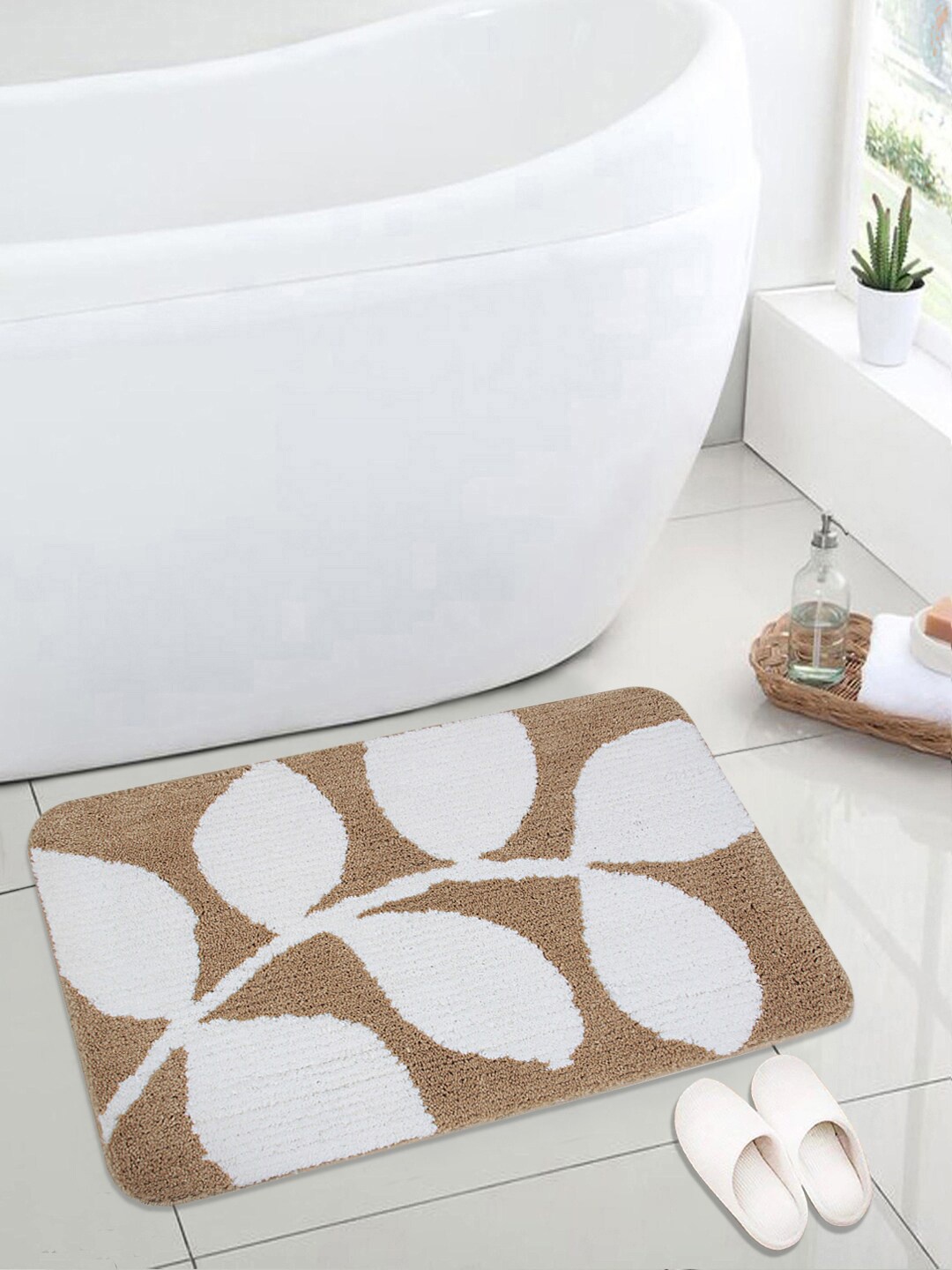 

Saral Home Beige & White Leaf Printed Microfiber Bath Rug