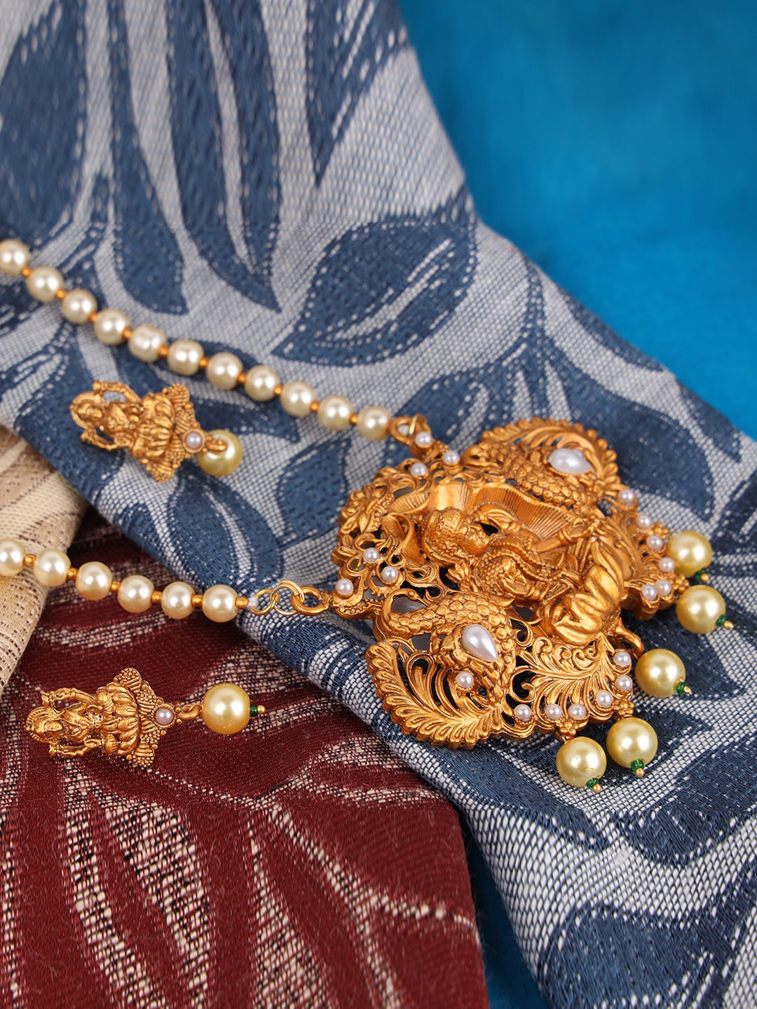 

ANIKAS CREATION Gold-Plated & Off-White Beaded Traditional Maa Laxmi Temple Religious Jewellery Set
