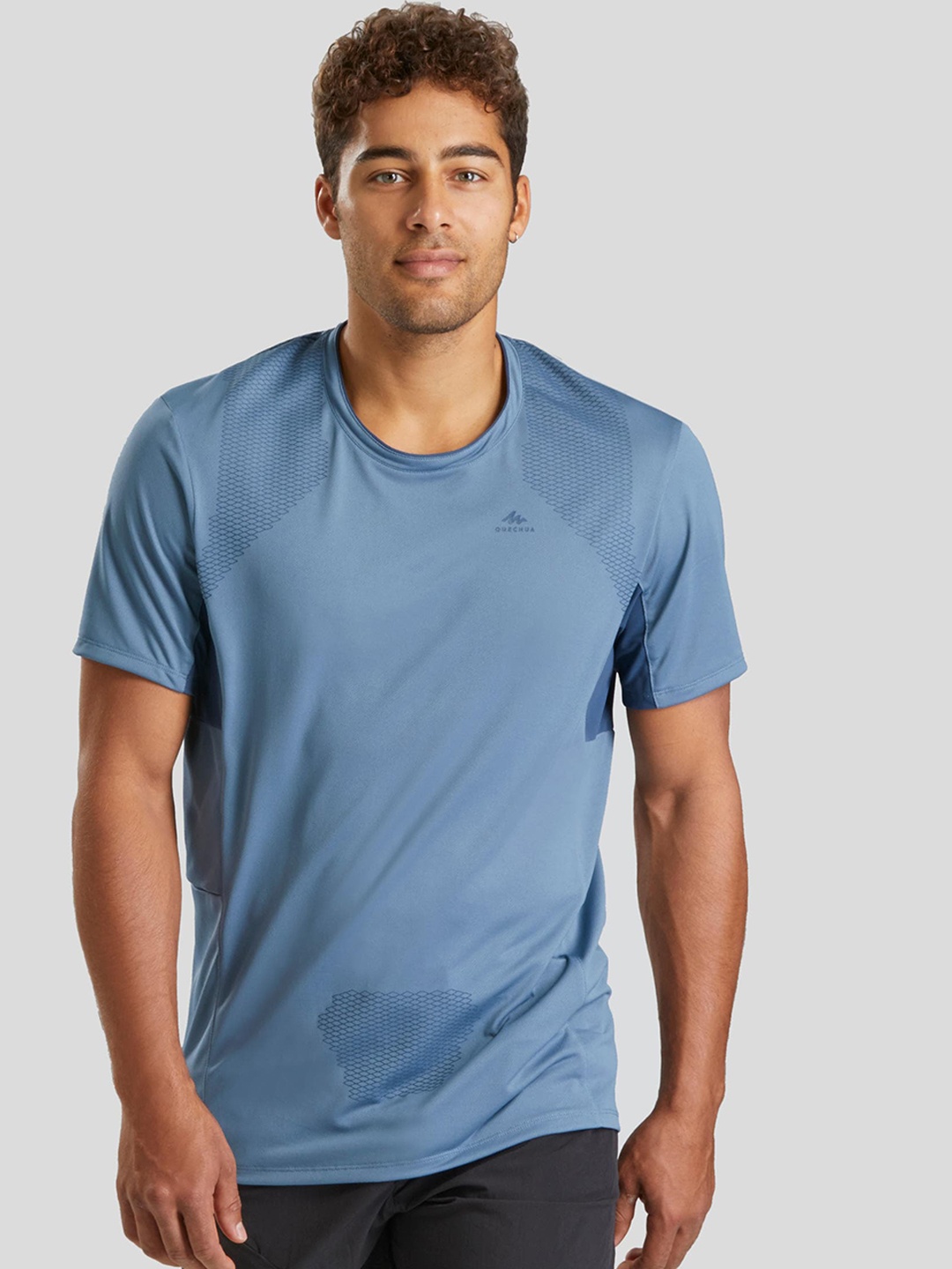 

Quechua By Decathlon Men blue Solid Quick Dry and Packable Hiking Tshirt