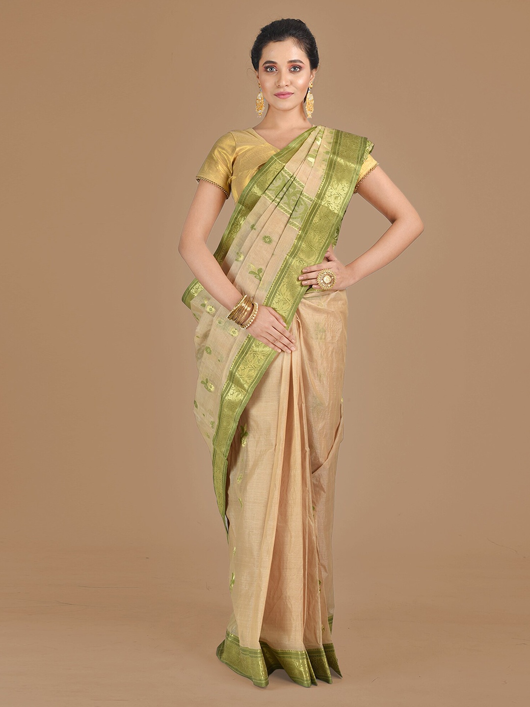 

Mitera Beige & Green Silk Blend Woven Design Tussar Saree