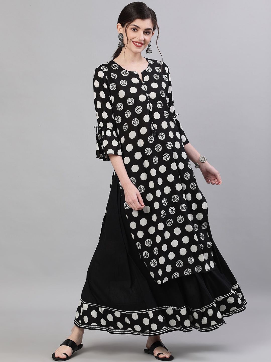 

Ishin Women Black & White Printed Kurta with Sharara