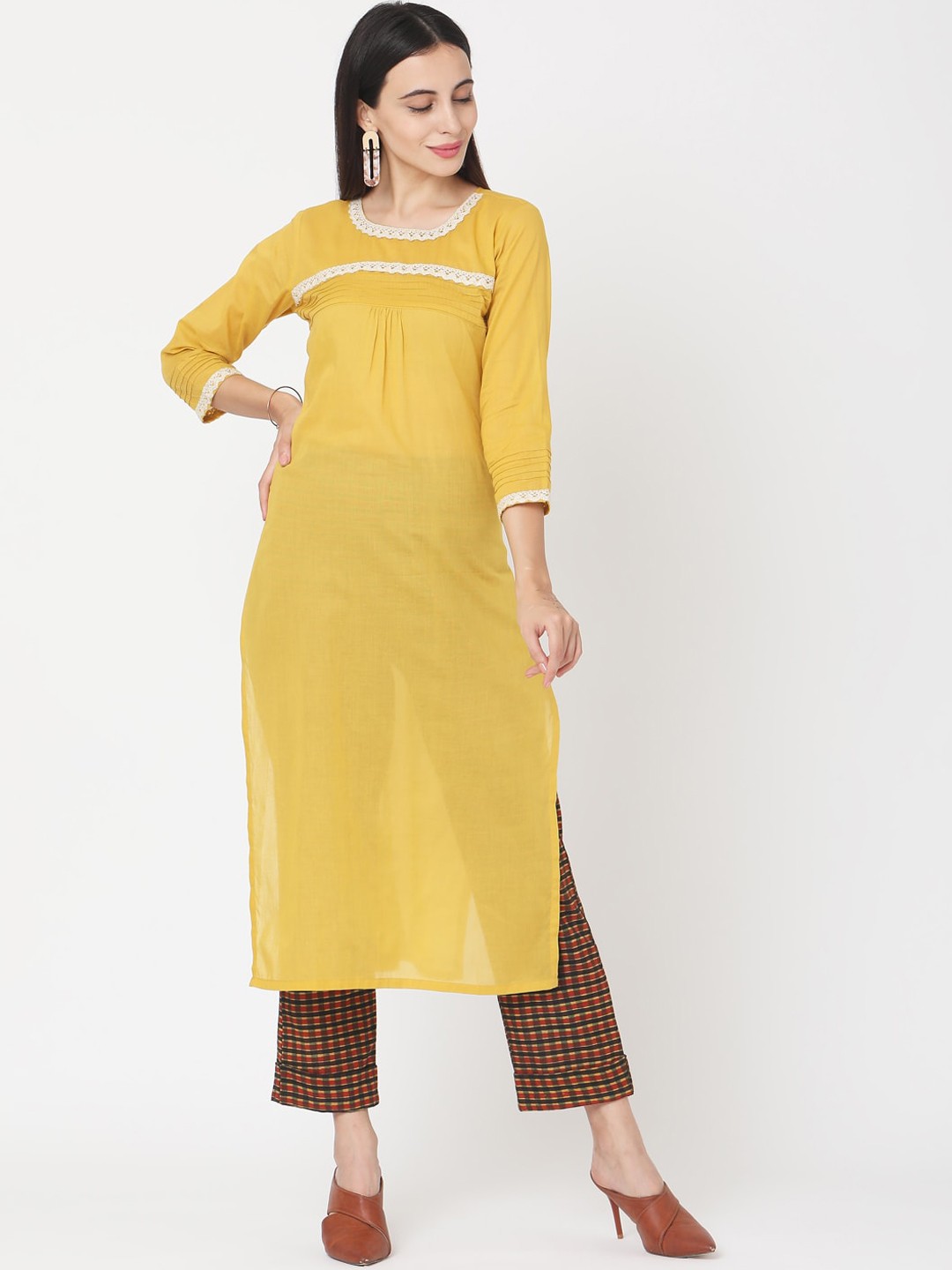 

Saanjh Women Yellow & Brown Solid Kurta with Trousers