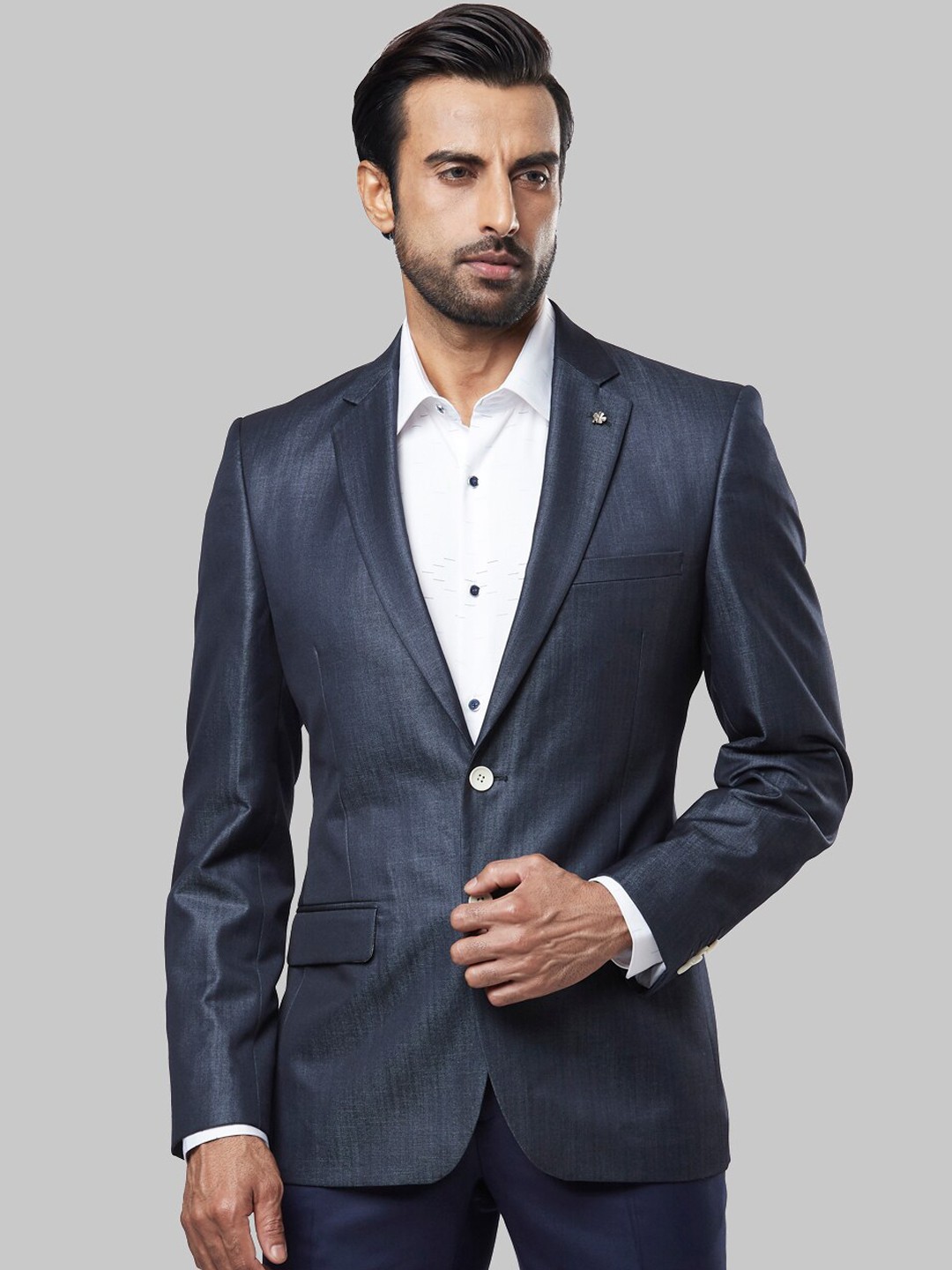 

Raymond Men Blue Solid Single-Breasted Formal Blazer