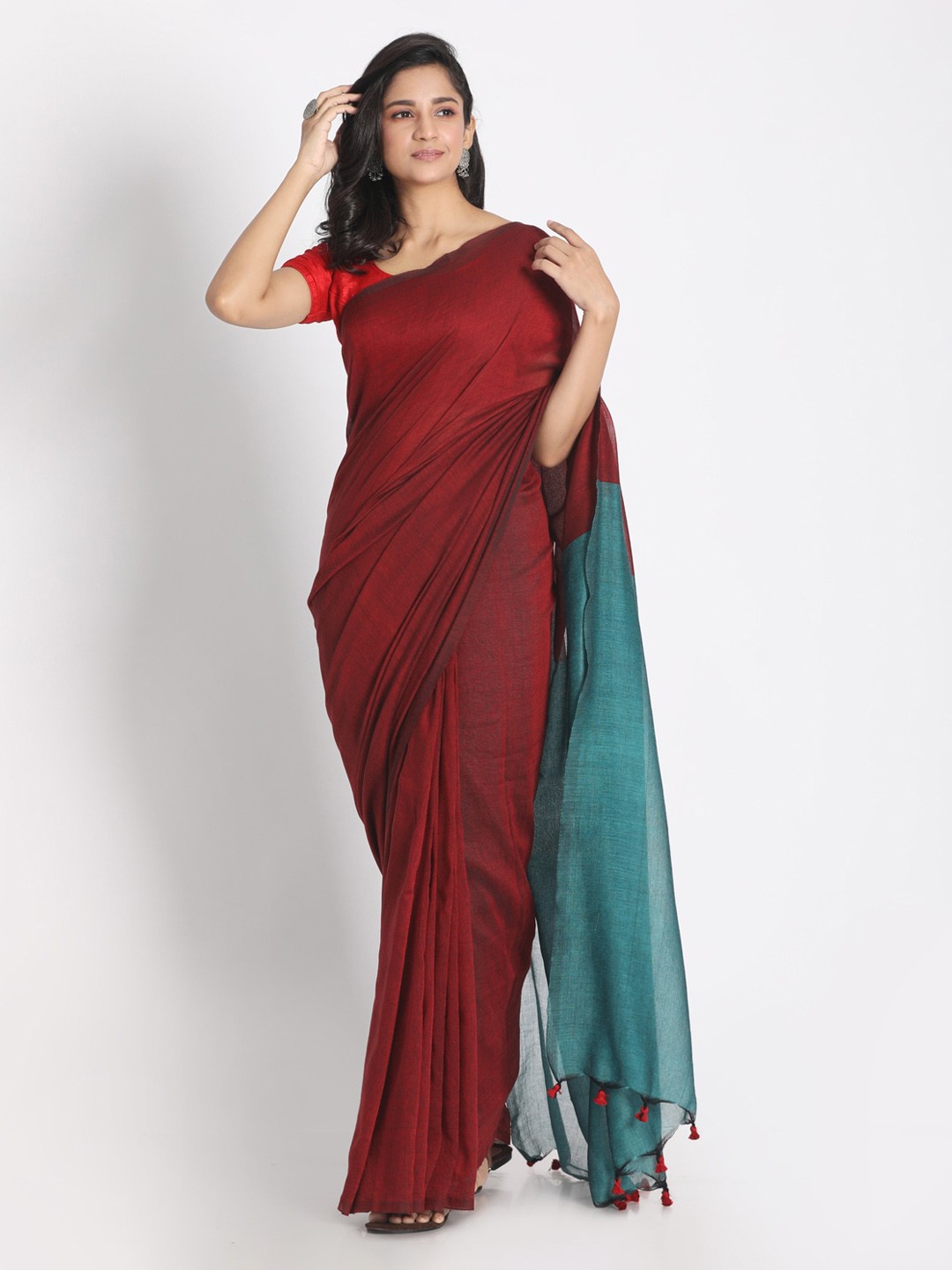 

Aryavart Maroon Solid Pure Cotton Saree