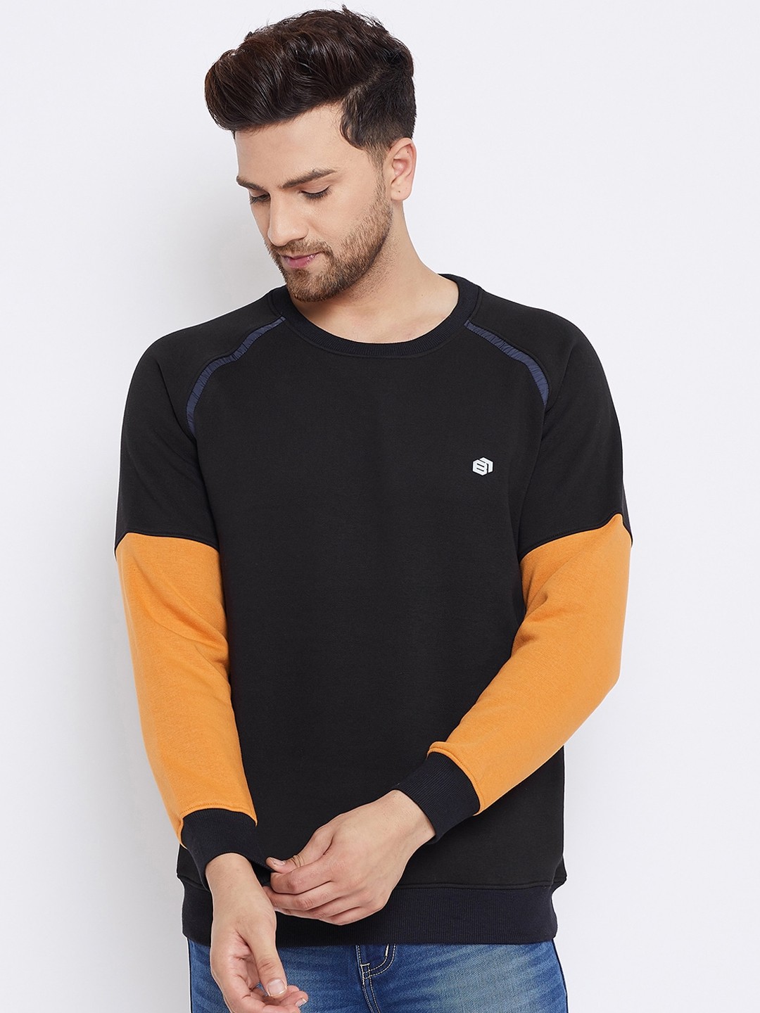 

Bishop Cotton Men Black & Orange Colourblocked Sweatshirt