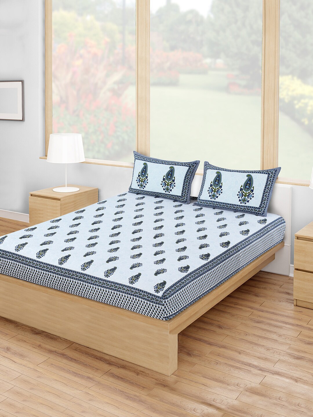

Salona Bichona White & Blue Printed 120 TC 1 Queen Bedsheet With 2 Pillow Covers