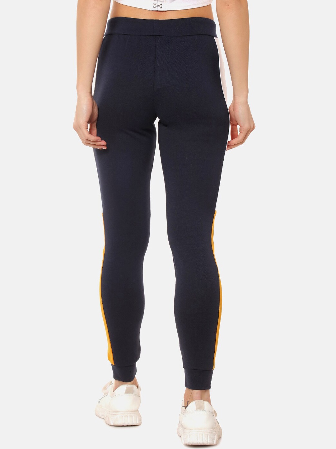 

Campus Sutra Women Navy Blue & Yellow Colourblocked Tights