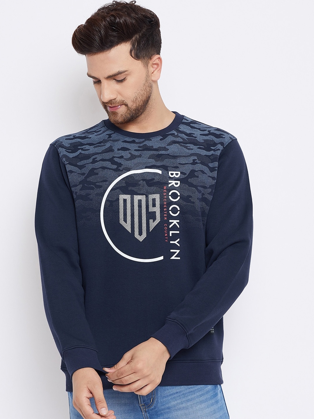 

Bishop Cotton Men Navy Blue Printed Sweatshirt