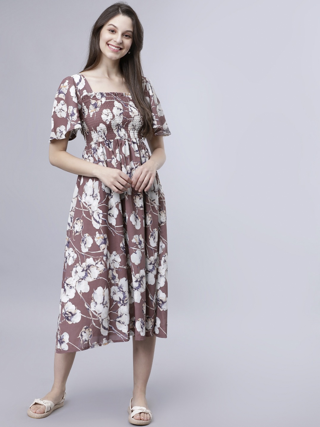 

Tokyo Talkies Women Purple Printed Fit and Flare Dress