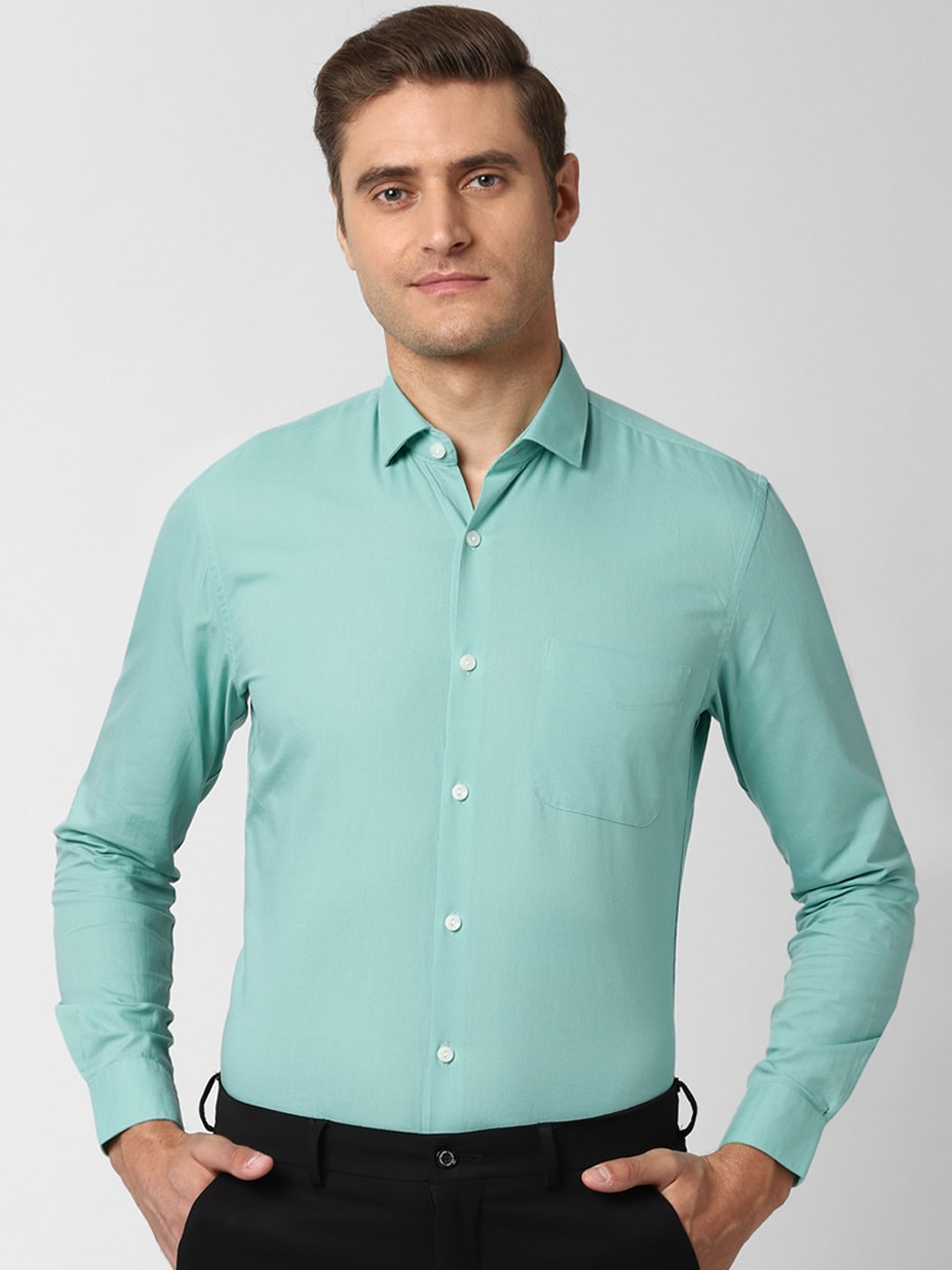 

Peter England Elite Men Blue Slim Fit Solid Cotton Formal Shirt
