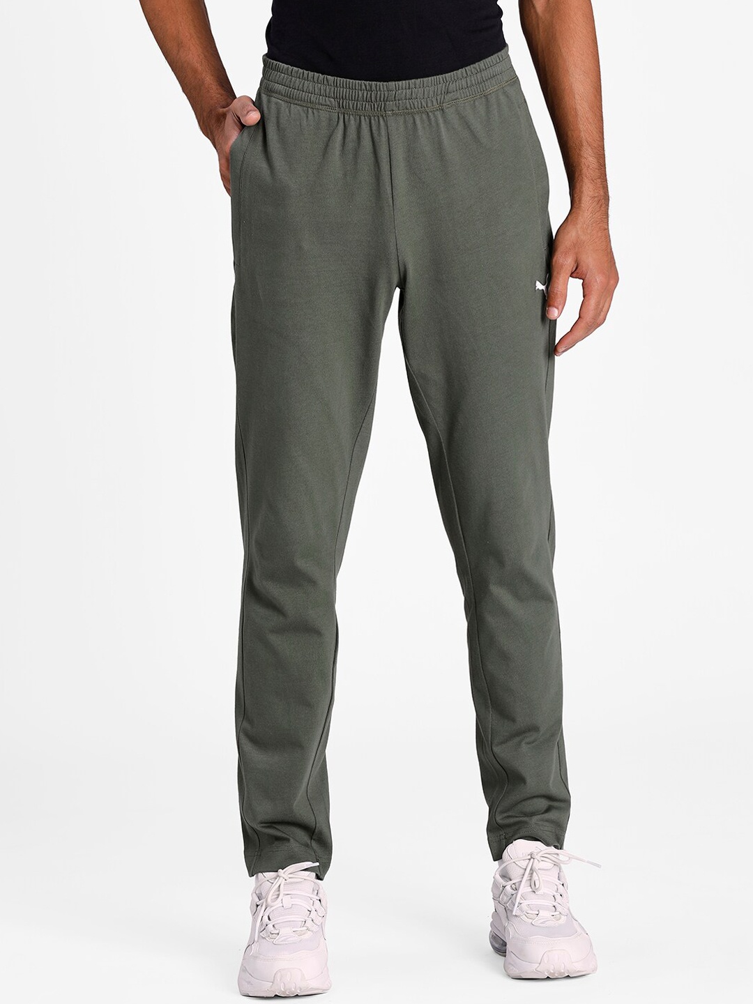 

Puma Men Green Solid Zippered Jersey Pants