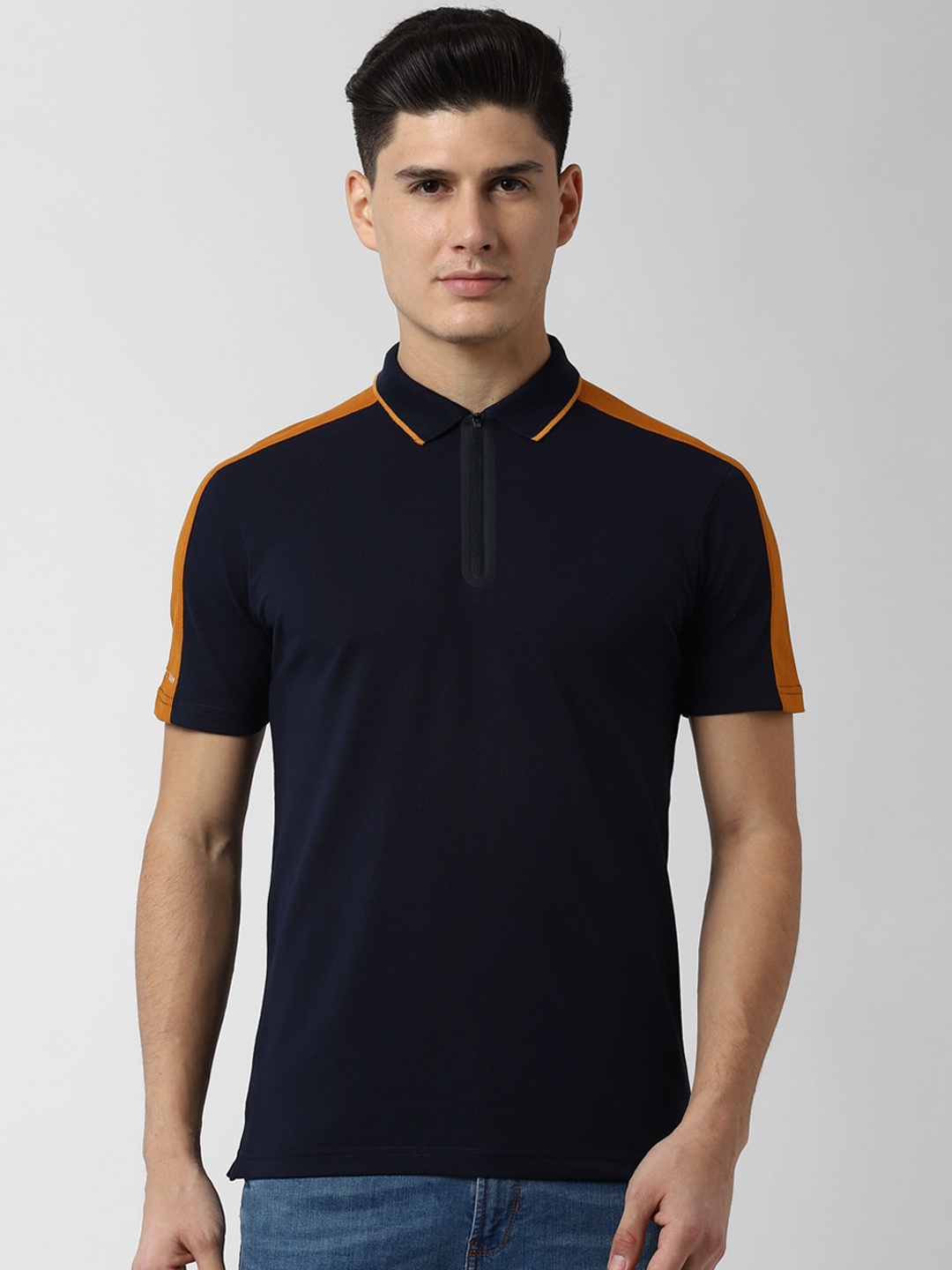 

Peter England Casuals Men Navy Blue Solid Polo Collar T-shirt