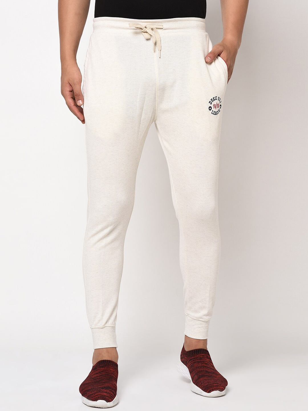 

Duke Men Beige Solid Slim Fit Track Pants