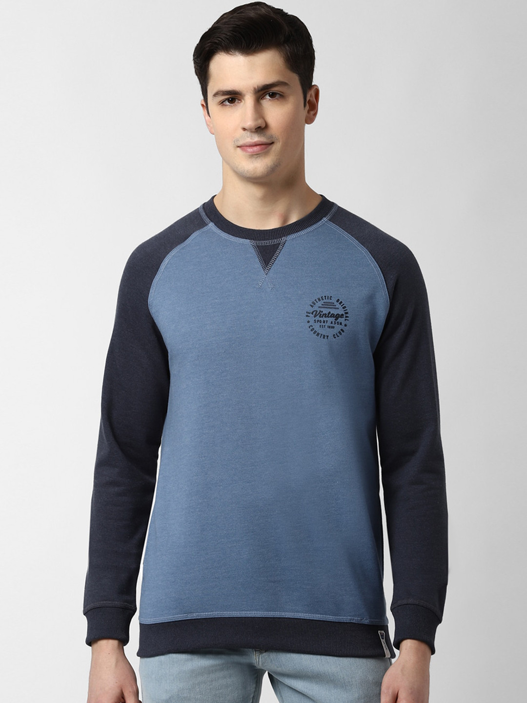 

Peter England Casuals Men Blue Solid Sweatshirt