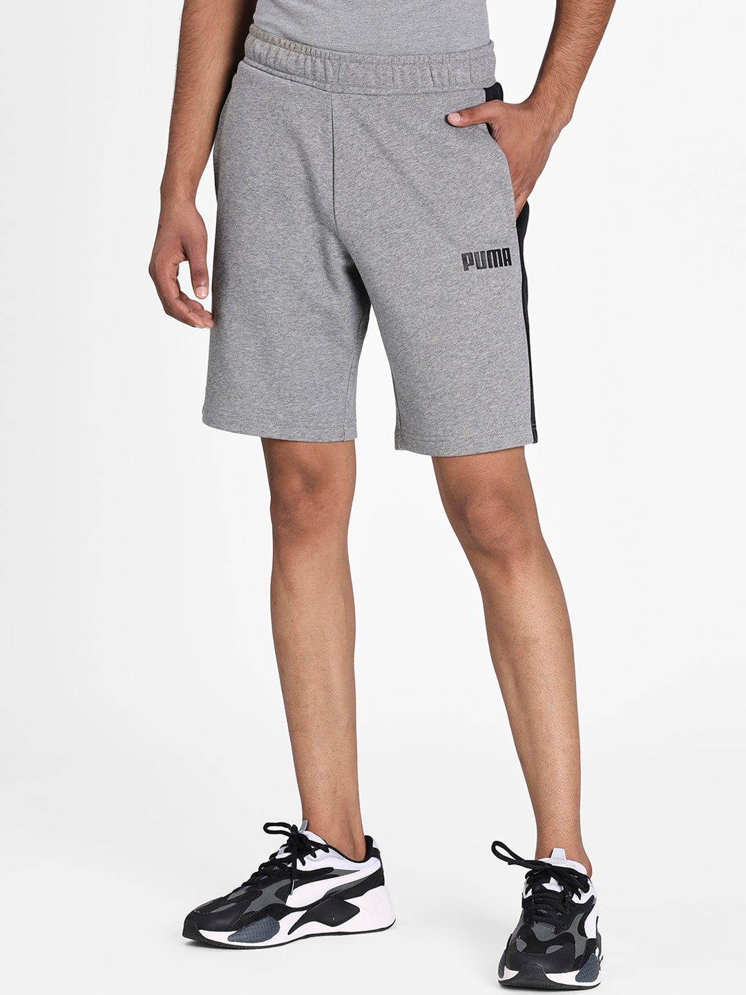 

Puma Men Grey Solid Regular Fit Sports Shorts