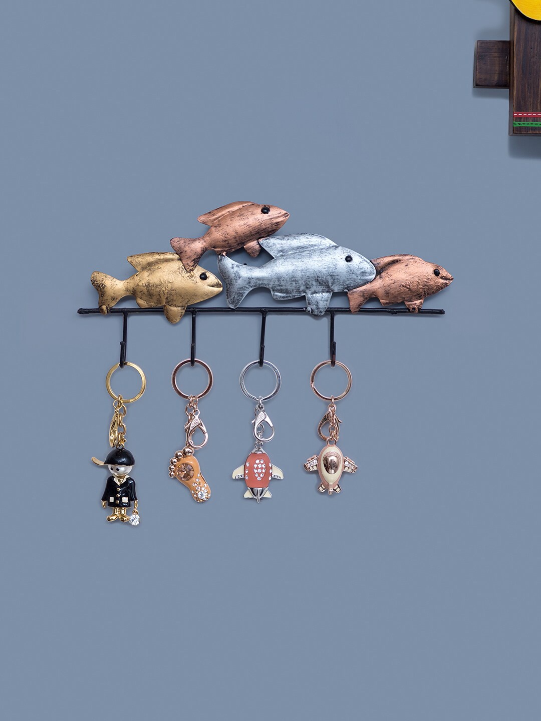 

Golden Peacock Black & Gold-Toned Fish Shaped Hand Painted 4 Hooks Key Holder