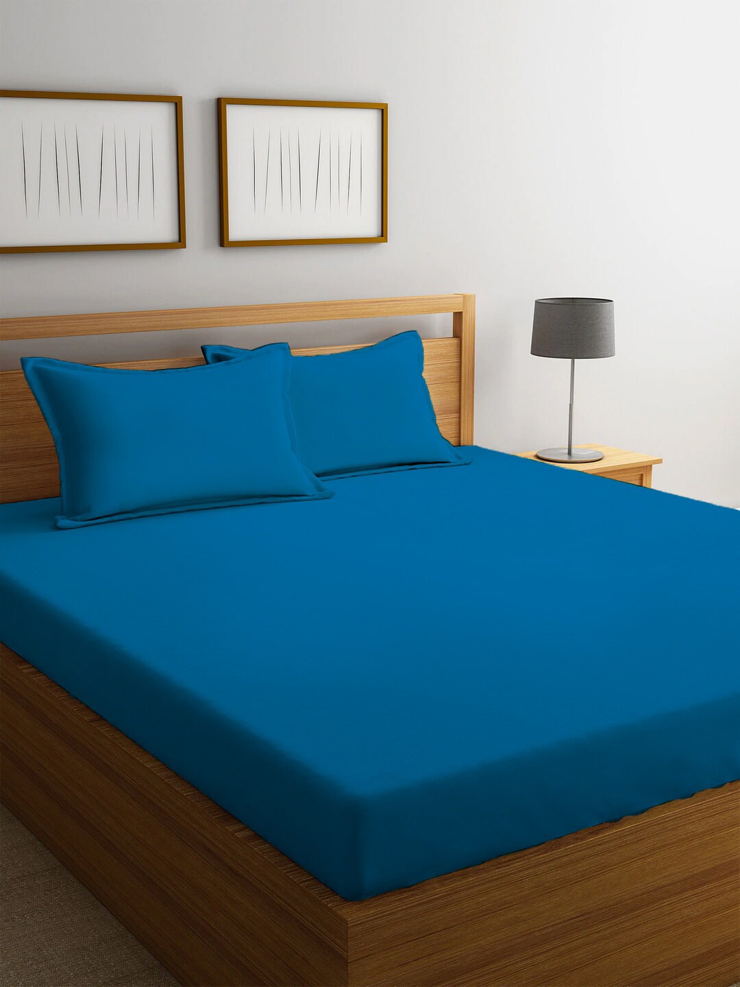 

Ariana Blue Solid 210 TC Cotton 2 King Bedsheet with 2 Pillow Covers