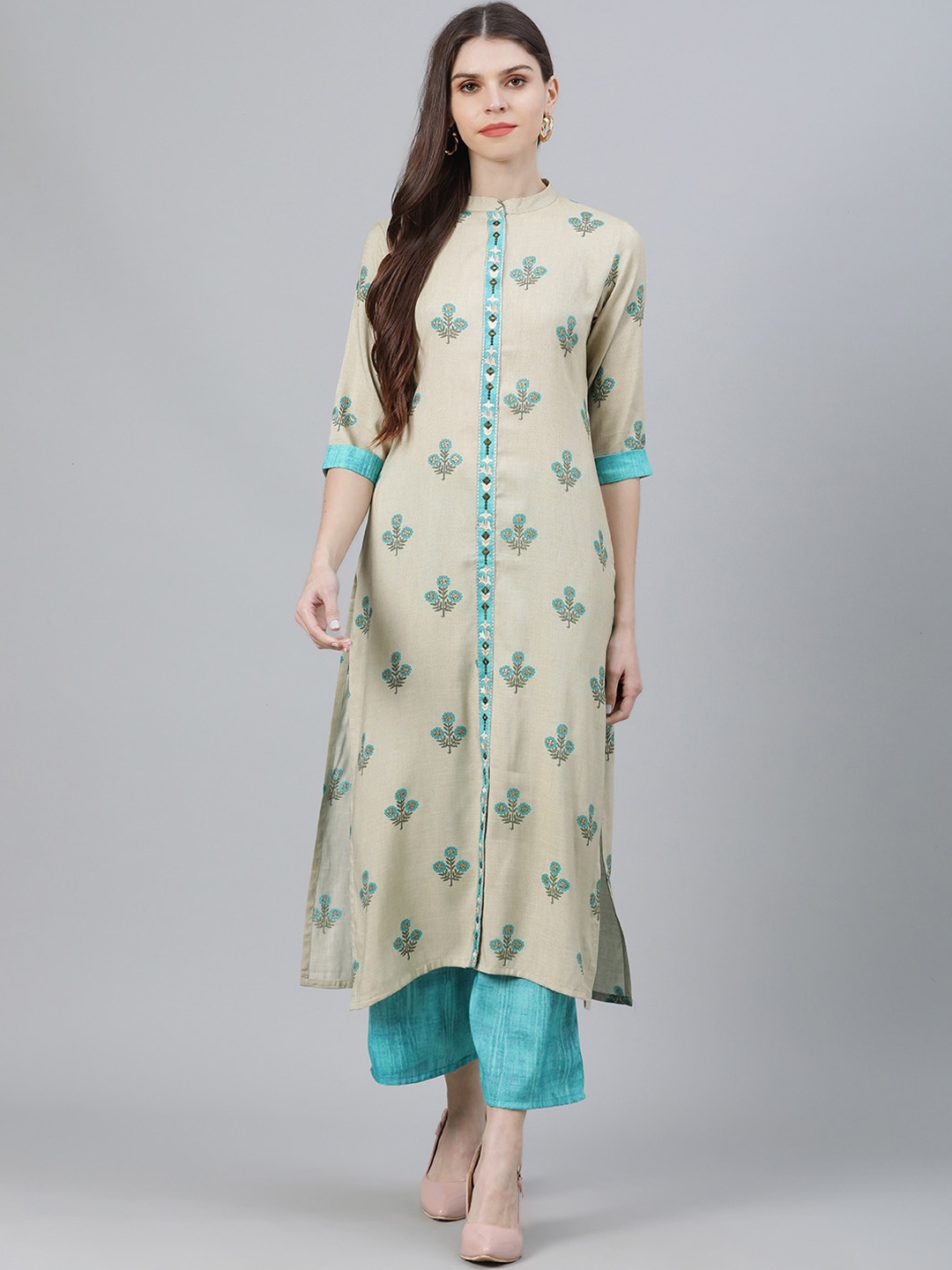 

Libas Women Beige Regular Thread Work Kurta with Palazzos