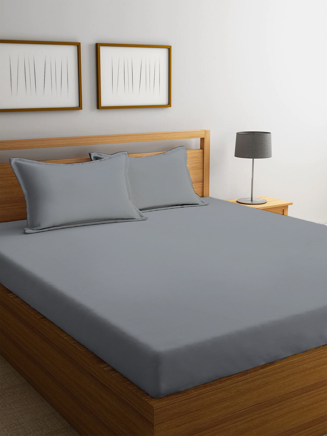 

Ariana Grey Solid 210 TC Cotton 1 King Bedsheet with 2 Pillow Covers