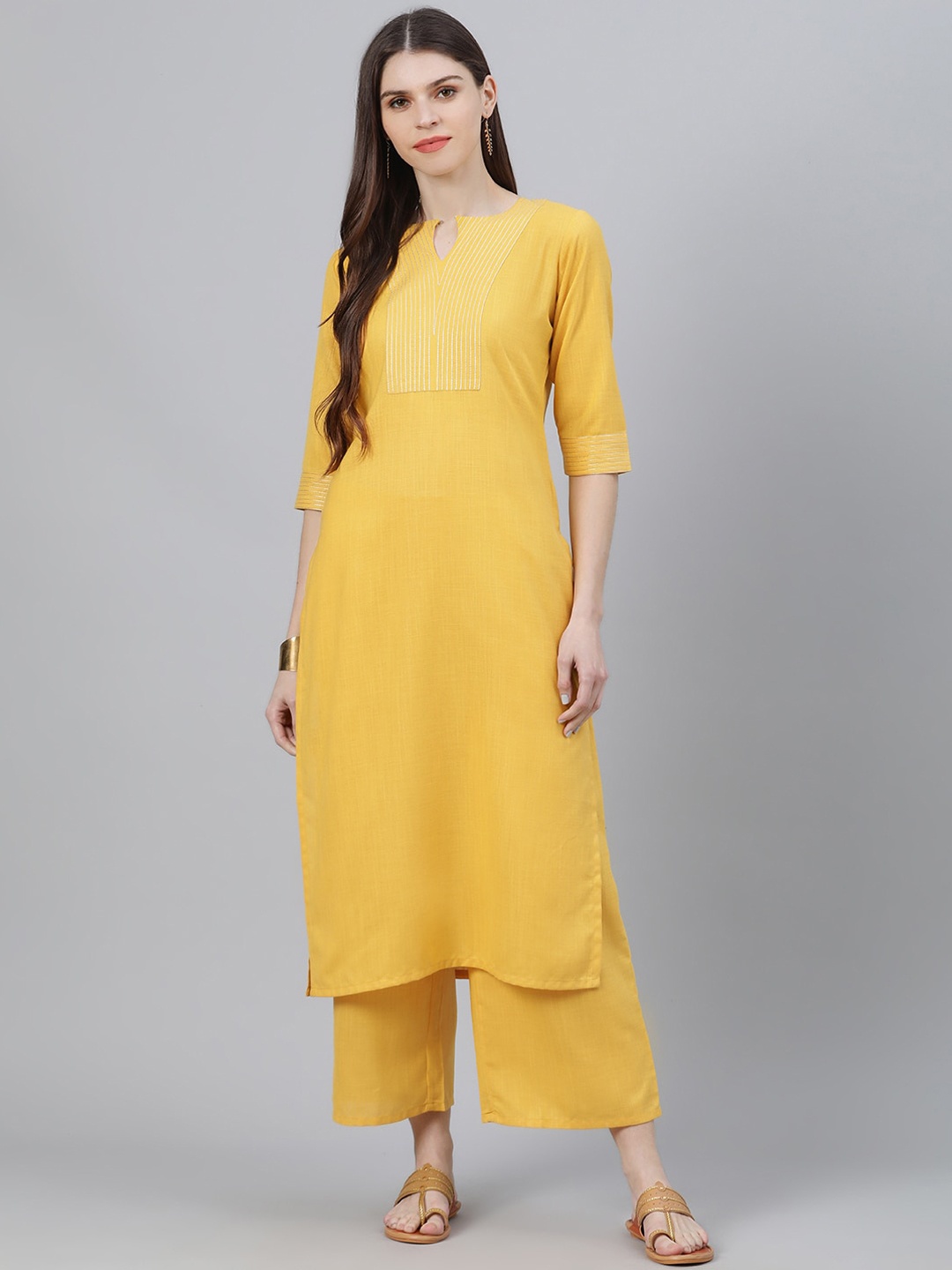 

Gerua By Libas Women Yellow Solid Kurta with Palazzos