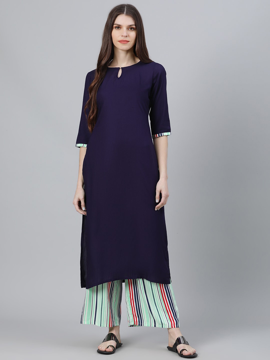 

Libas Women Navy Blue Solid Kurta with Palazzos