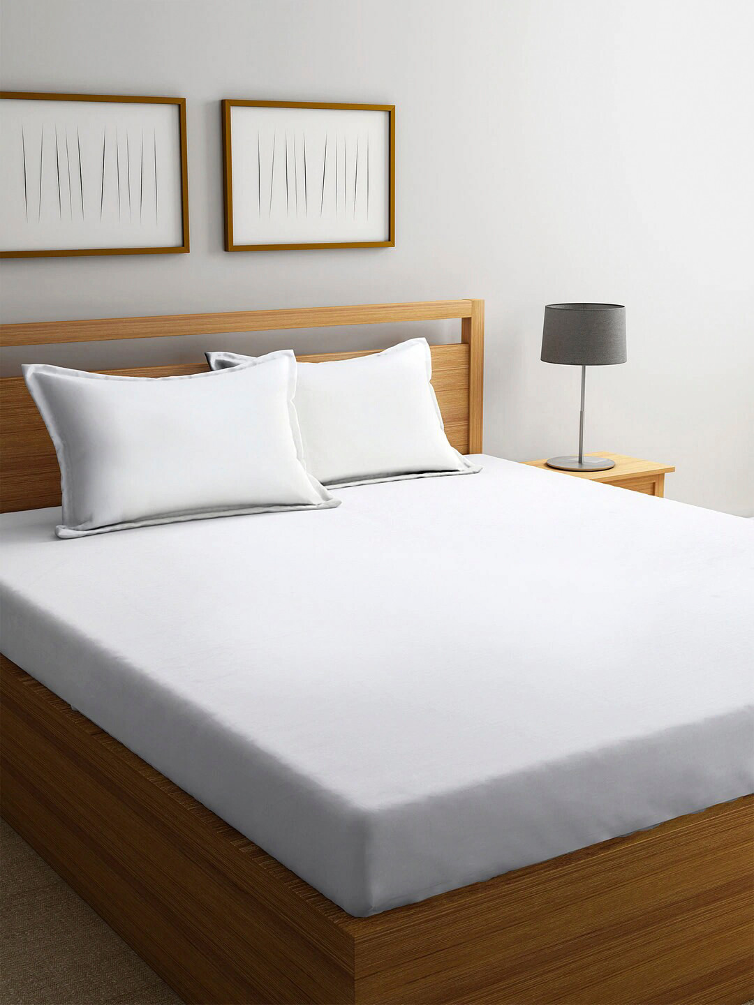 

Ariana White Solid 210 TC Cotton 1 King Bedsheet with 2 Pillow Covers