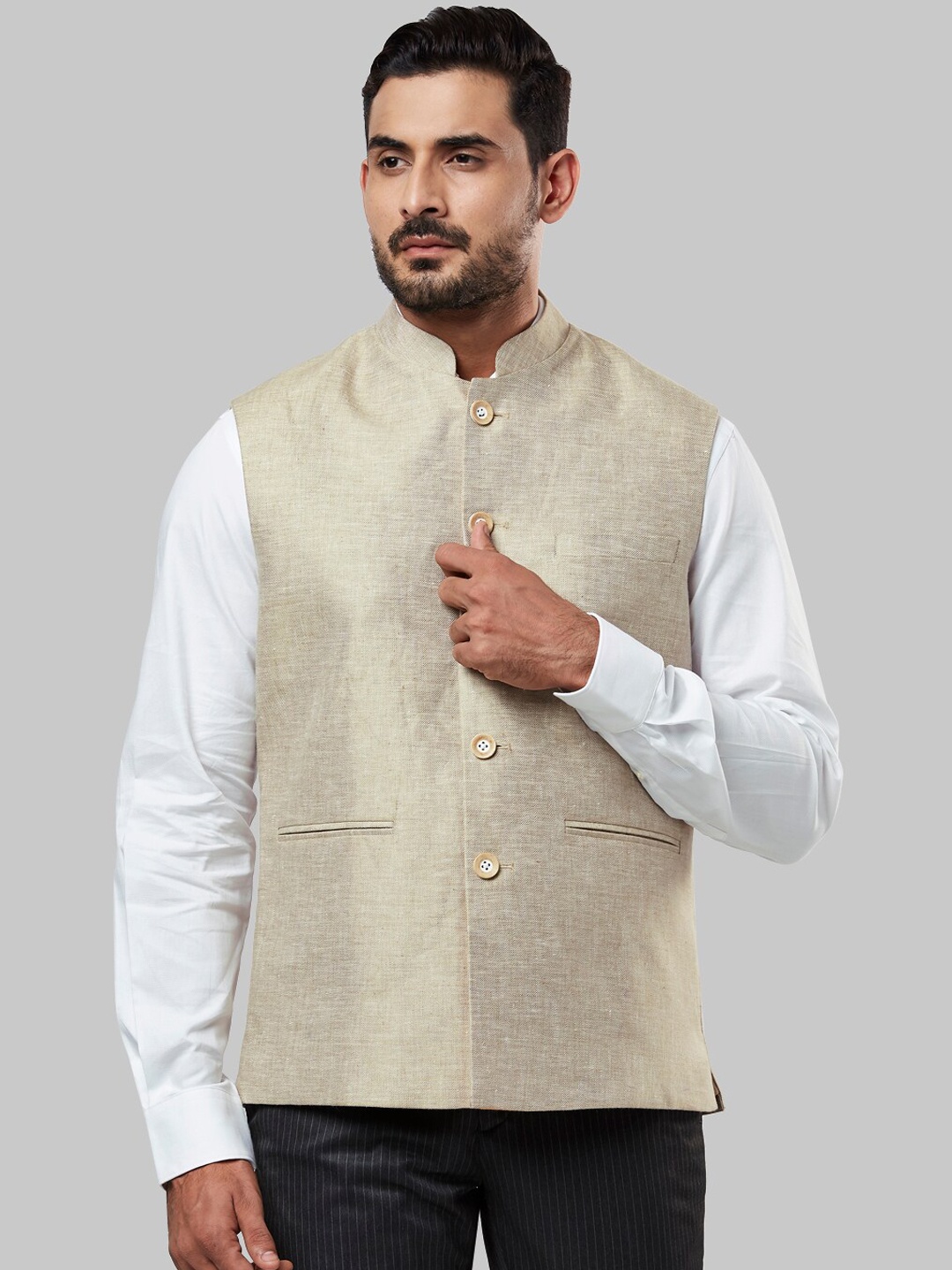 

Raymond Men Beige Solid Nehru Jacket